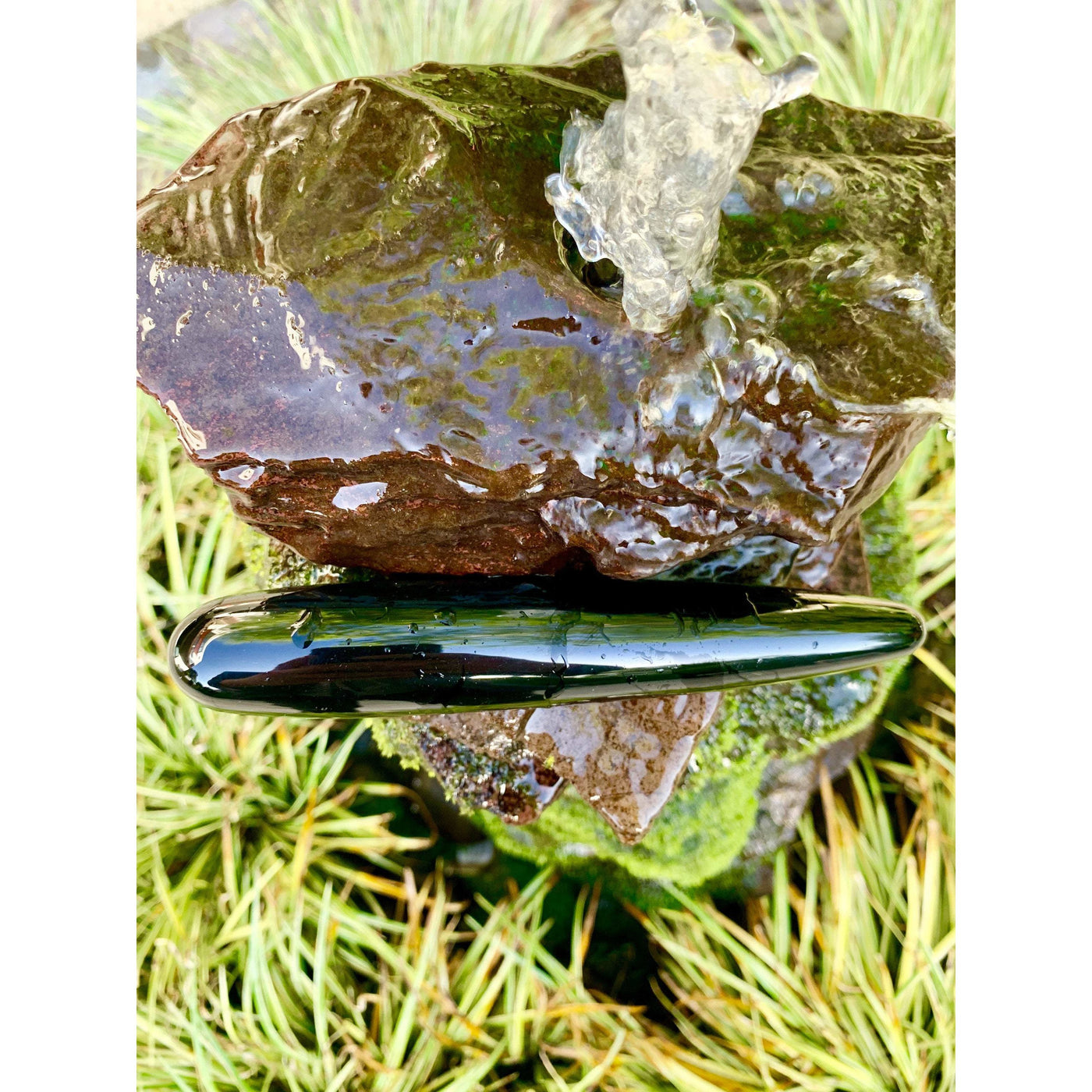 wet black crystal wand 